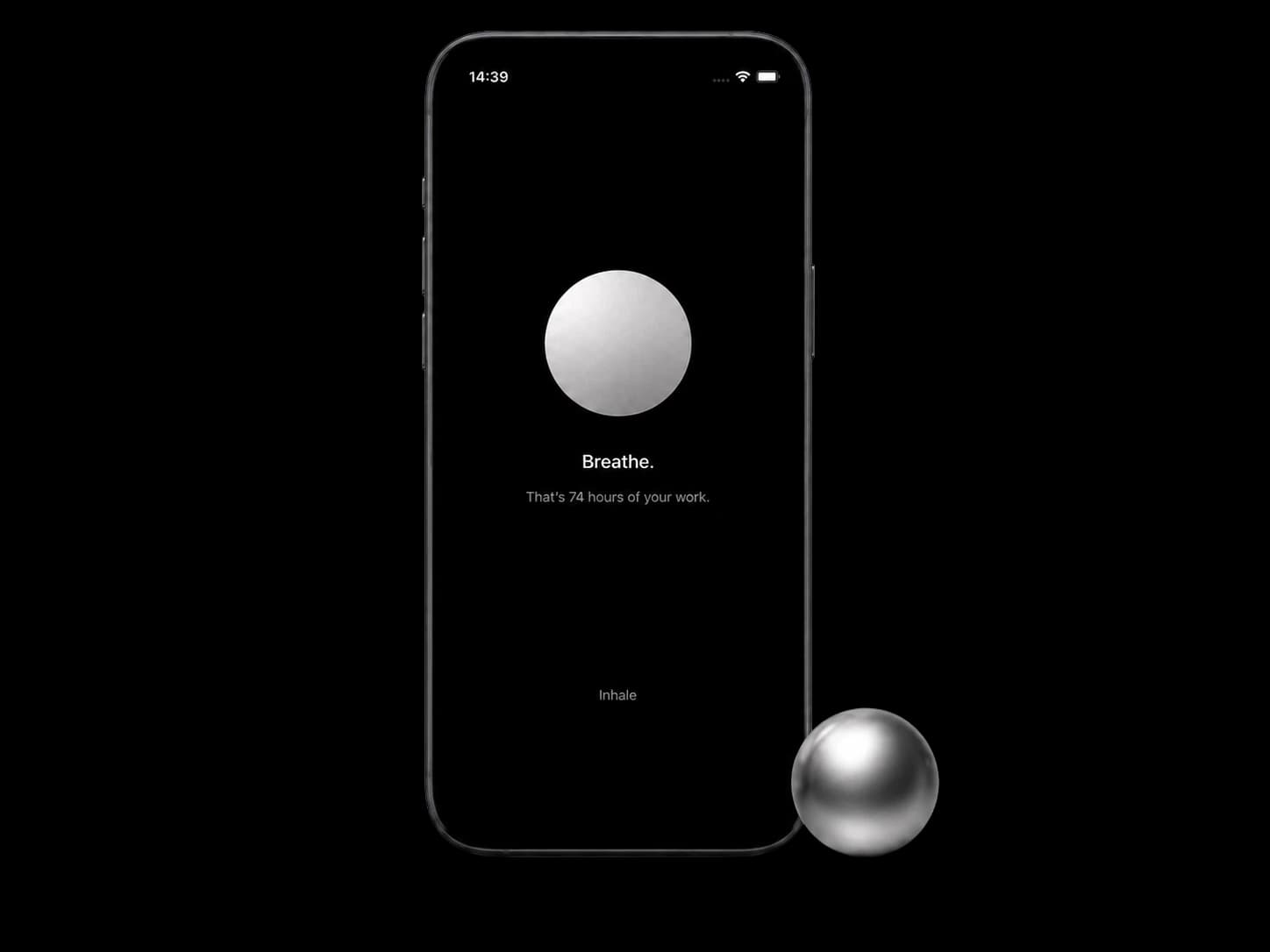 Axyom Breathe screen — a silver sphere, 'That's 74 hours of your work', and an Inhale prompt.